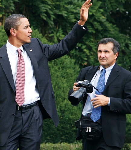 White House photographer Pete Souza, right, follows President Barack Obama at an event supporting Chicago's 2016 Olympic bid on the South Lawn of the White House in Washington, Wednesday, Sept. 16, 2009. (AP Photo/Charles Dharapak)